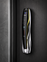 
Lavora Prism Elite polished chrome smart door lock installed on a dark wood door