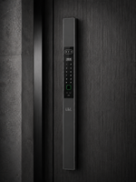 Lavora Vertica slim smart door lock installed on a dark wood door